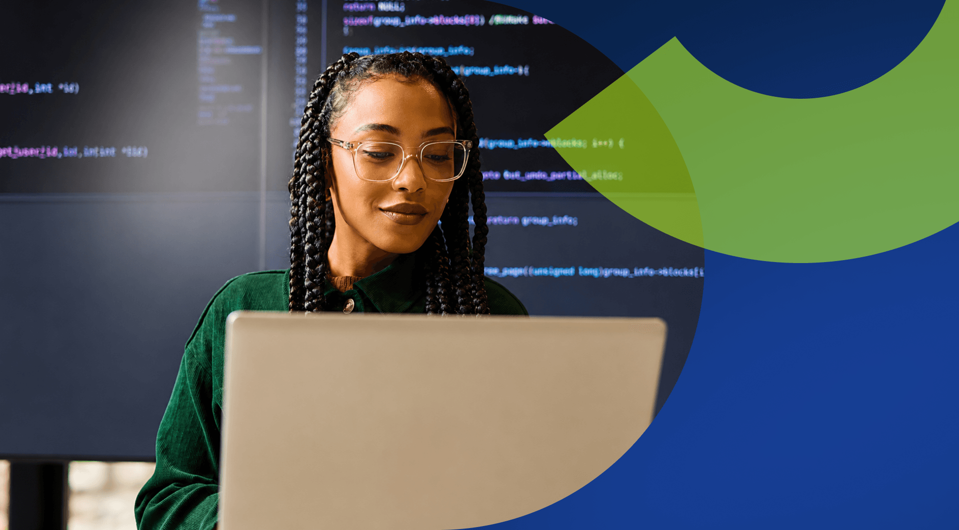 Young woman with glasses and braids coding on a laptop with lines of code in background.